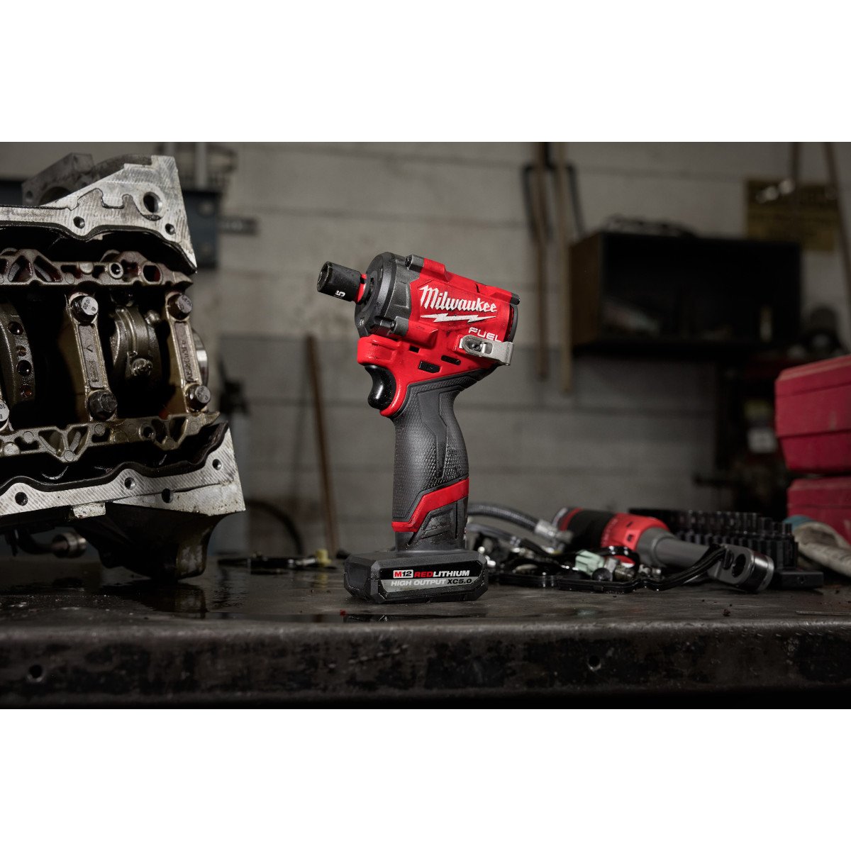 Milwaukee 2562-22 M12 FUEL™ Stubby 3/8" Impact Wrench Kit - in use