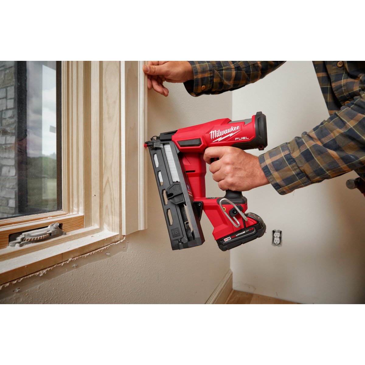 Milwaukee 2841-20 M18 FUEL™ 16 Gauge Angled Finish Nailer - in use