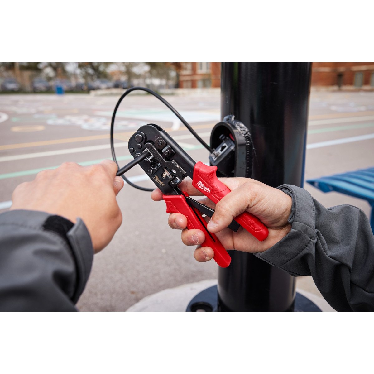 Milwaukee 48-22-3076 Ratcheting Modular Crimper & Stripper - in use