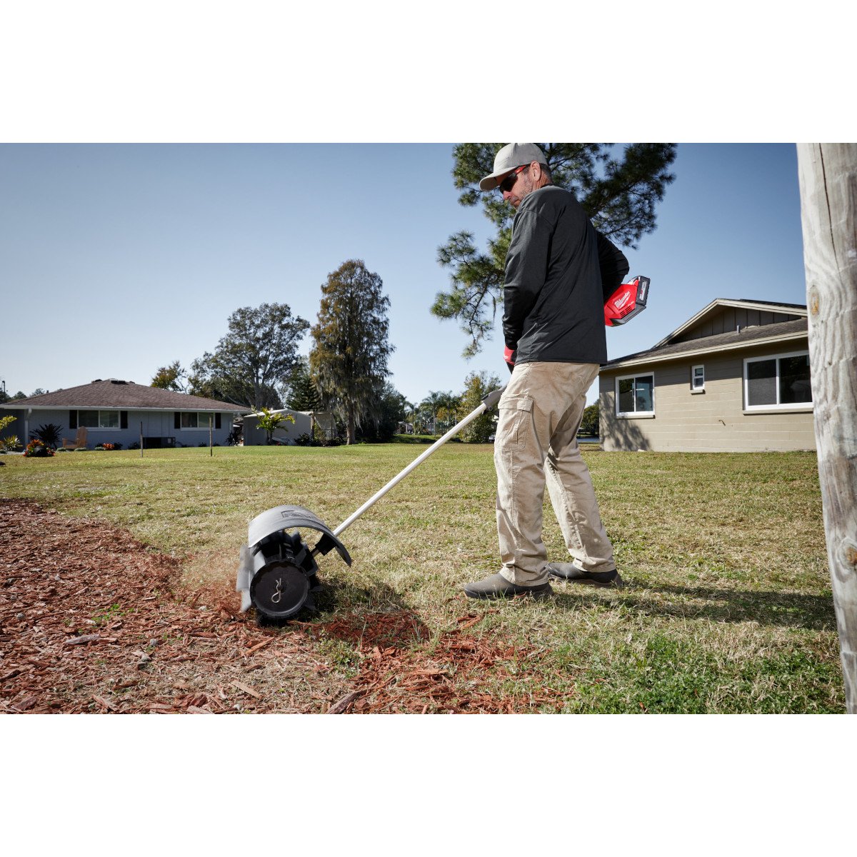 Milwaukee 49-16-2740 M18 FUEL™ QUIK-LOK™ Rubber Broom Attachment - in use