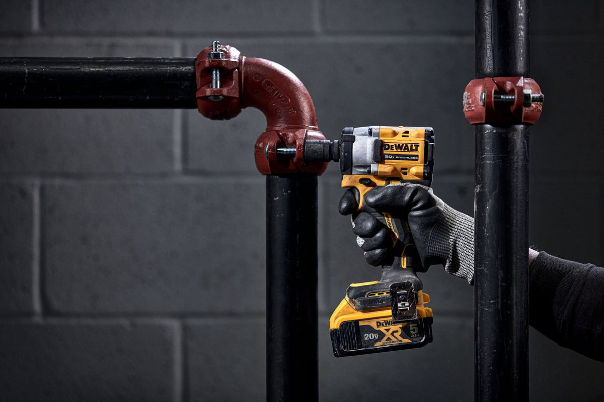 DEWALT DCF921B ATOMIC 20V MAX 1/2 in. Cordless Impact Wrench with Hog Ring Anvil (Tool Only) - in use
