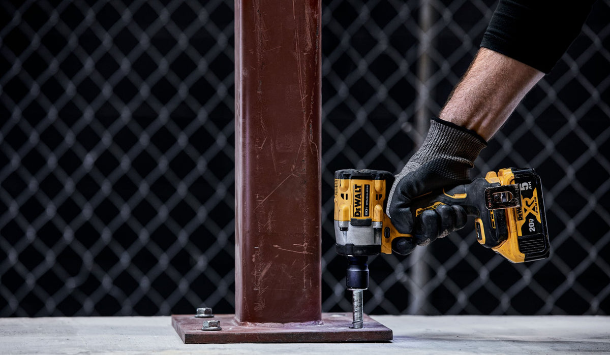 DEWALT DCF922B ATOMIC 20V MAX* 1/2 IN. CORDLESS IMPACT WRENCH WITH DETENT PIN ANVIL (TOOL ONLY) - in use