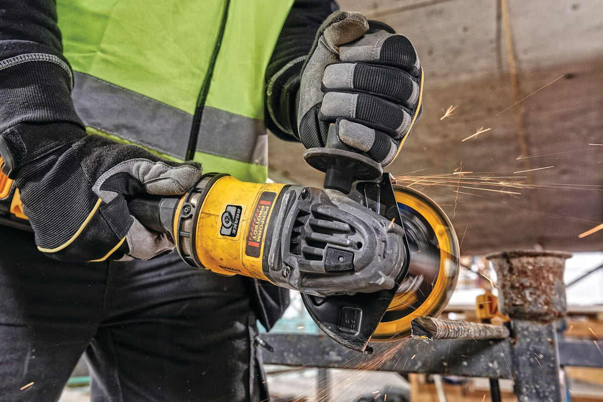 DEWALT DCG418X2 Gen 2 - 60V BRUSHLESS 4-1/2"-6" GRINDER KIT (2 - DCB609) - in use