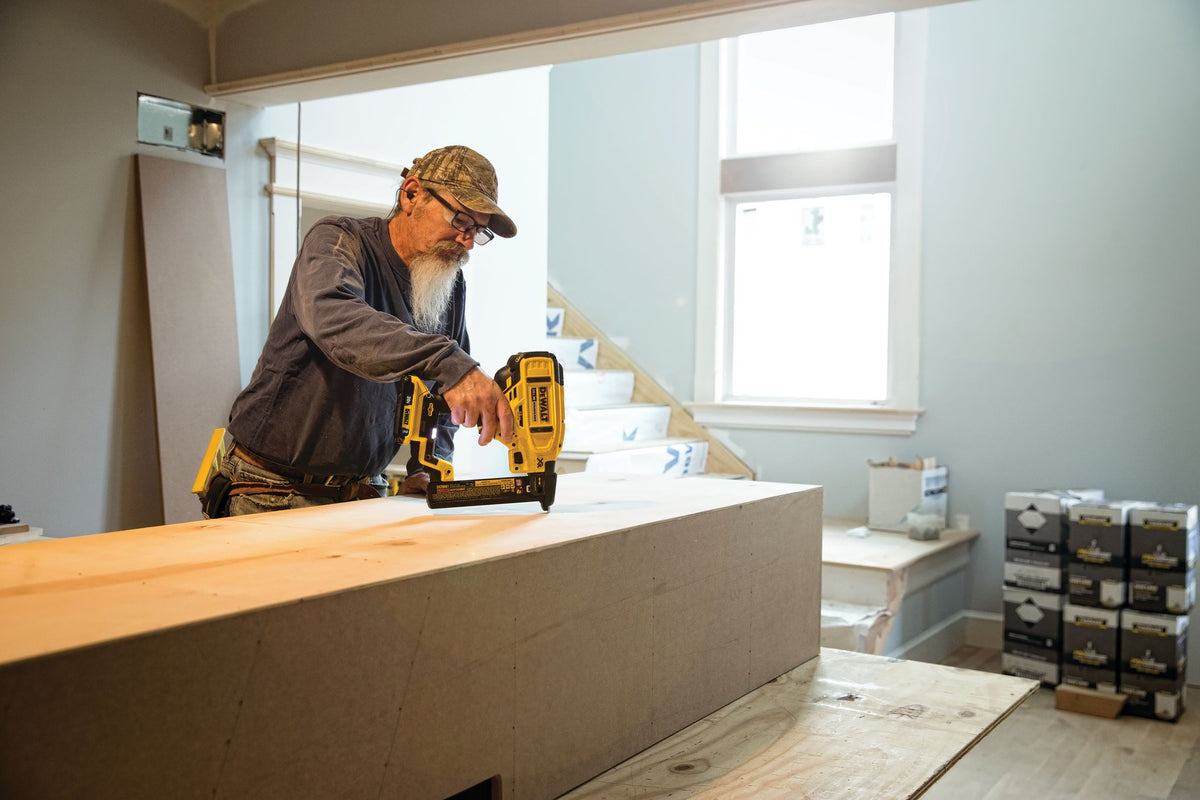 DEWALT DCN681B 20V MAX* XR® 18 GA Cordless Narrow Crown Stapler (Tool Only) - in use