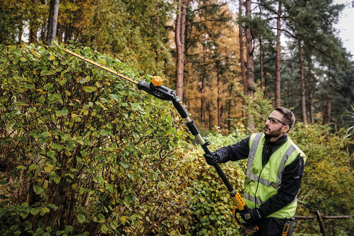 DEWALT DCPH820B 20V MAX Pole Hedge Trimmer - in use