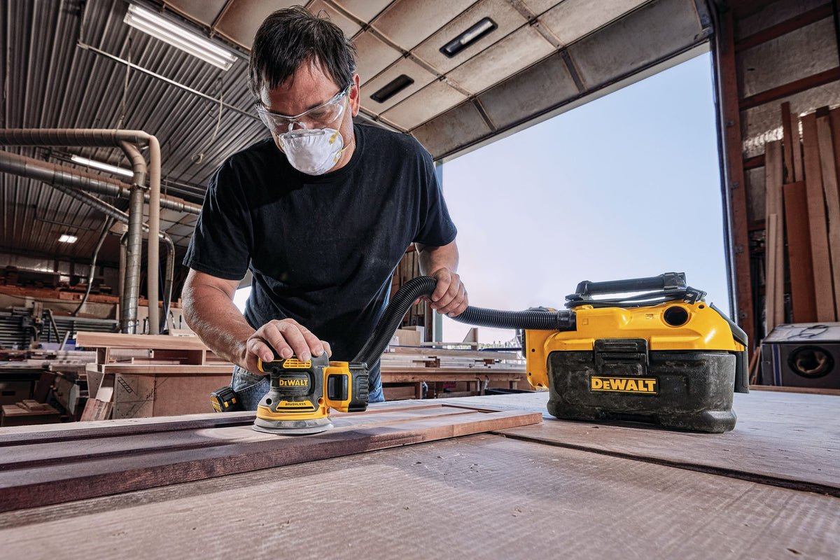 DEWALT DCW210B 20V MAX* XR 5 in Brushless Cordless Variable-Speed Random Orbital Sander (Tool Only) - in use