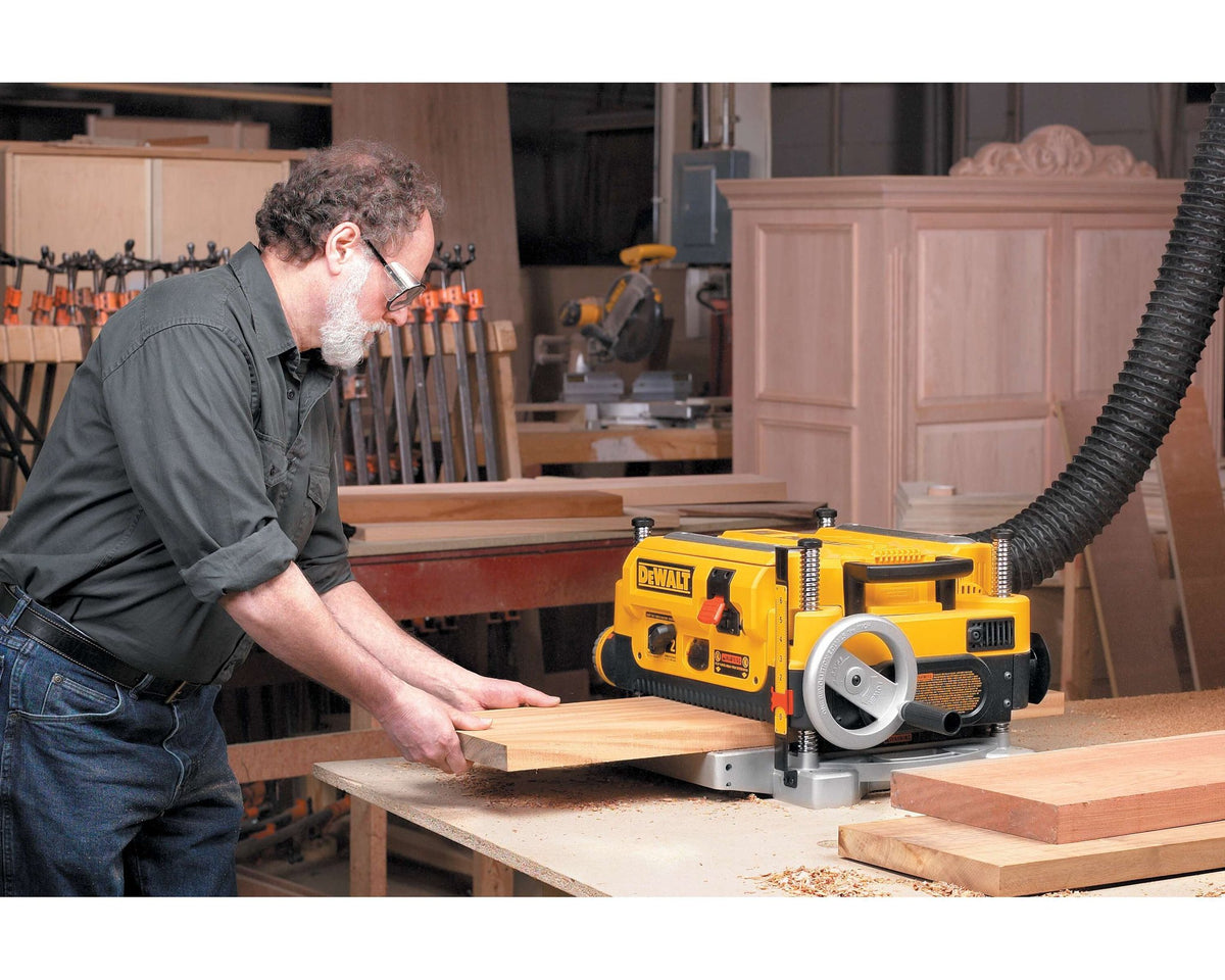 DEWALT DW735 13-Inch, Two Speed Thickness Planer - in use
