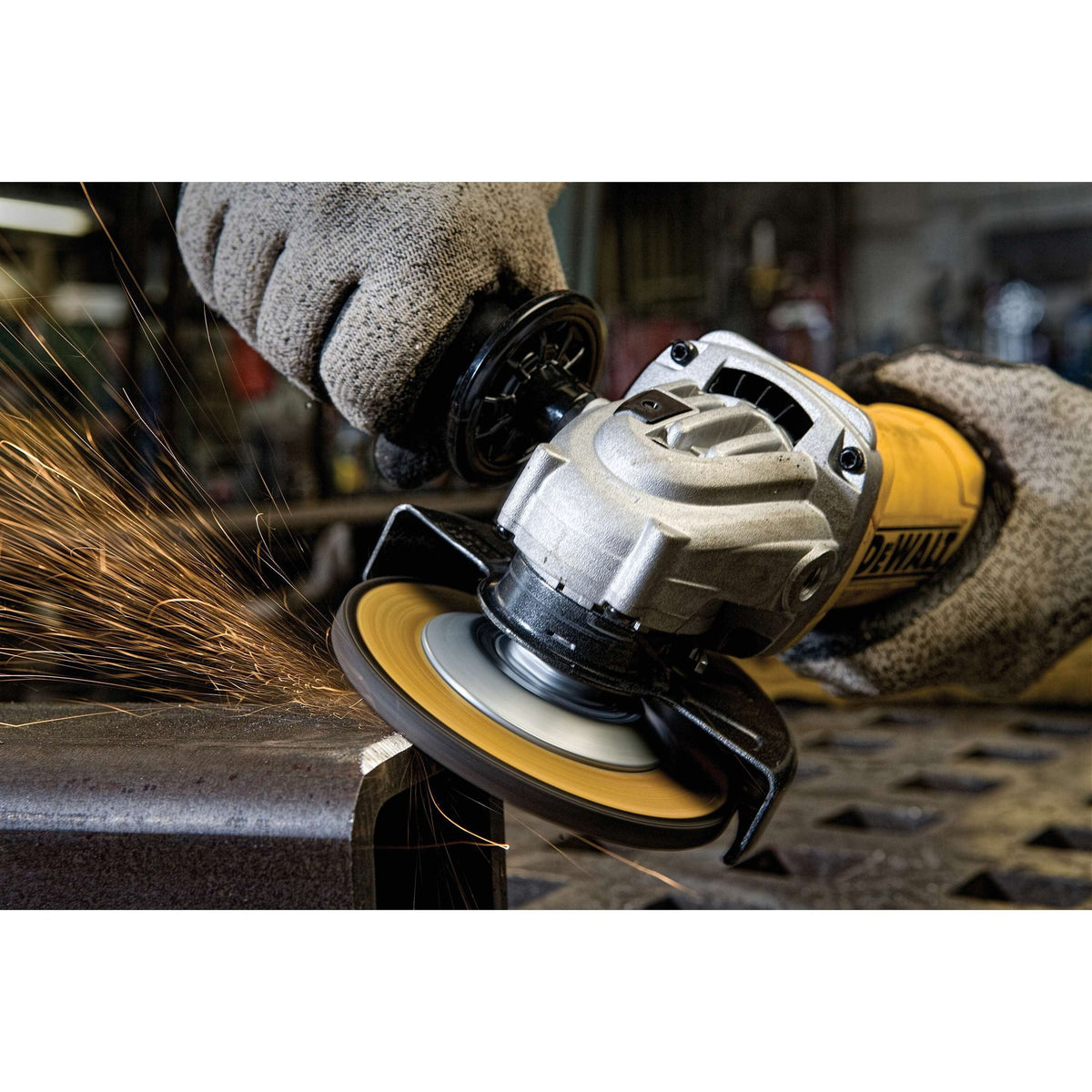 DEWALT DWE402 Angle Grinder Tool, Paddle Switch, 4-1/2-Inch, 11-Amp - in use