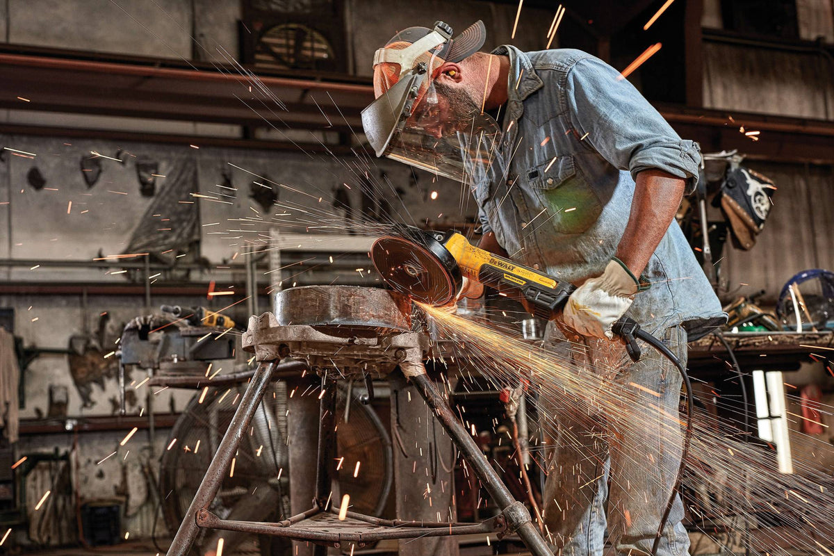 DEWALT DWE43840CN Angle Grinder, Rat Tail, 7-Inch, 13-Amp - in use