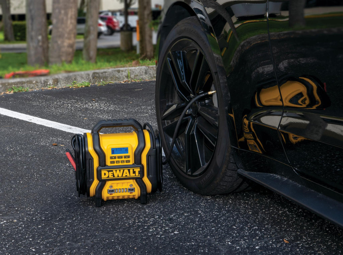 DEWALT DXAEPS14-CA 2000-Peak Amp Portable Jump Starter with Digital Compressor, USB and AC Power Bank - in use