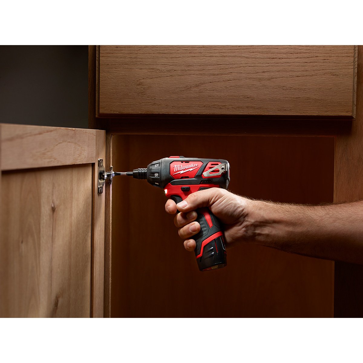 Milwaukee 2401-22 M12™ 1/4 in. Hex Screwdriver - in use