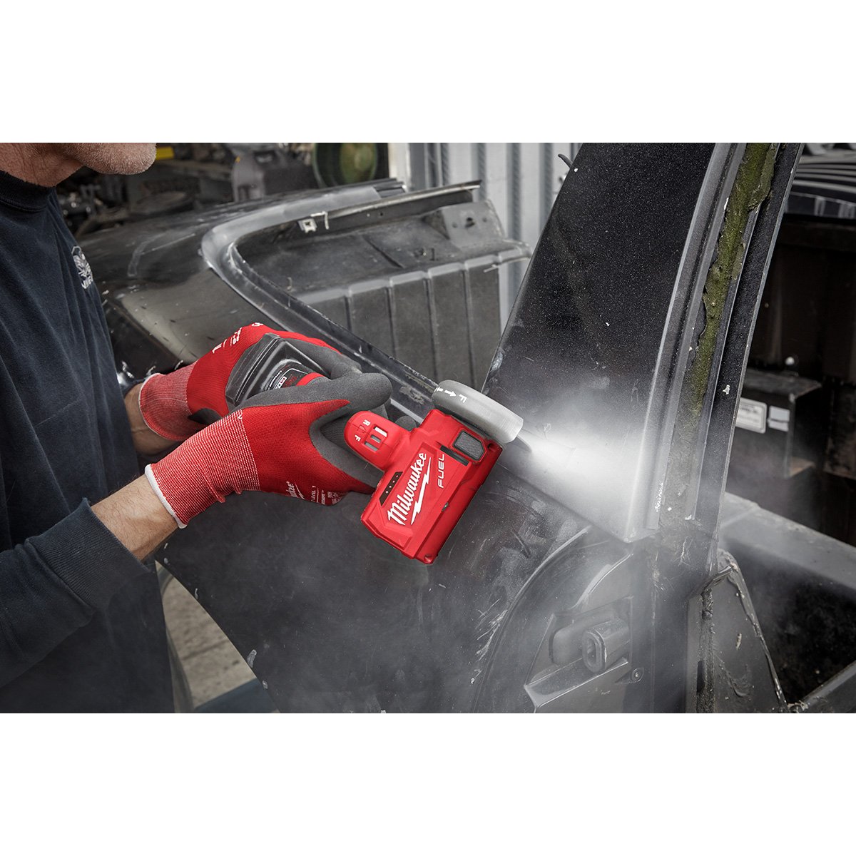 Milwaukee 2522-21XC M12 FUEL™ 3 in. Compact Cut Off Tool Kit - in use