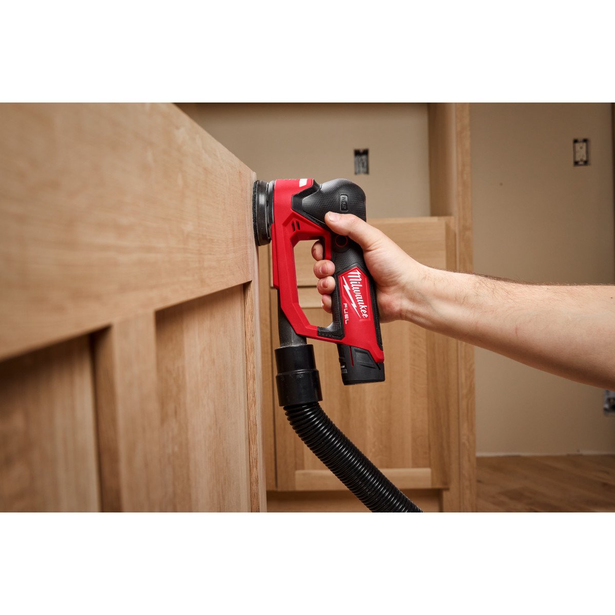 Milwaukee 2535-20 M12 FUEL™ 3" Random Orbital Detail Sander - in use