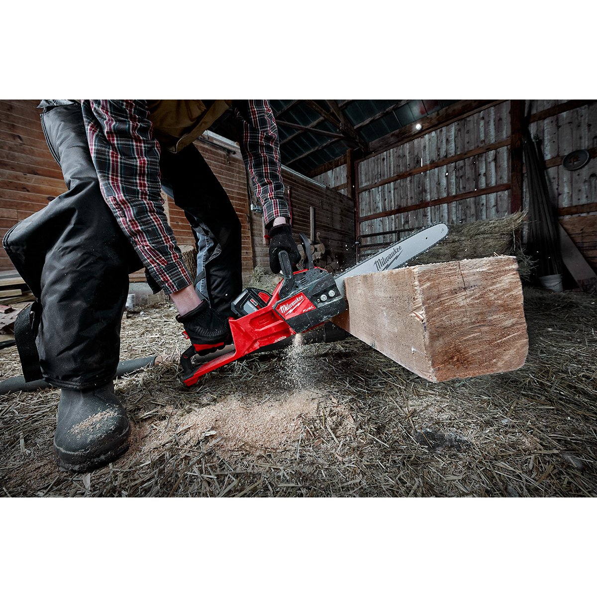 Milwaukee 2727-20C M18 FUEL™ 14" Chainsaw - in use