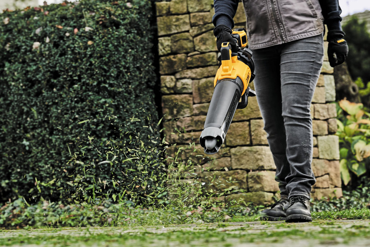DEWALT DCBL722B 20V MAX* Lithium Ion XR Brushless Handheld Blower (Tool Only) - in use