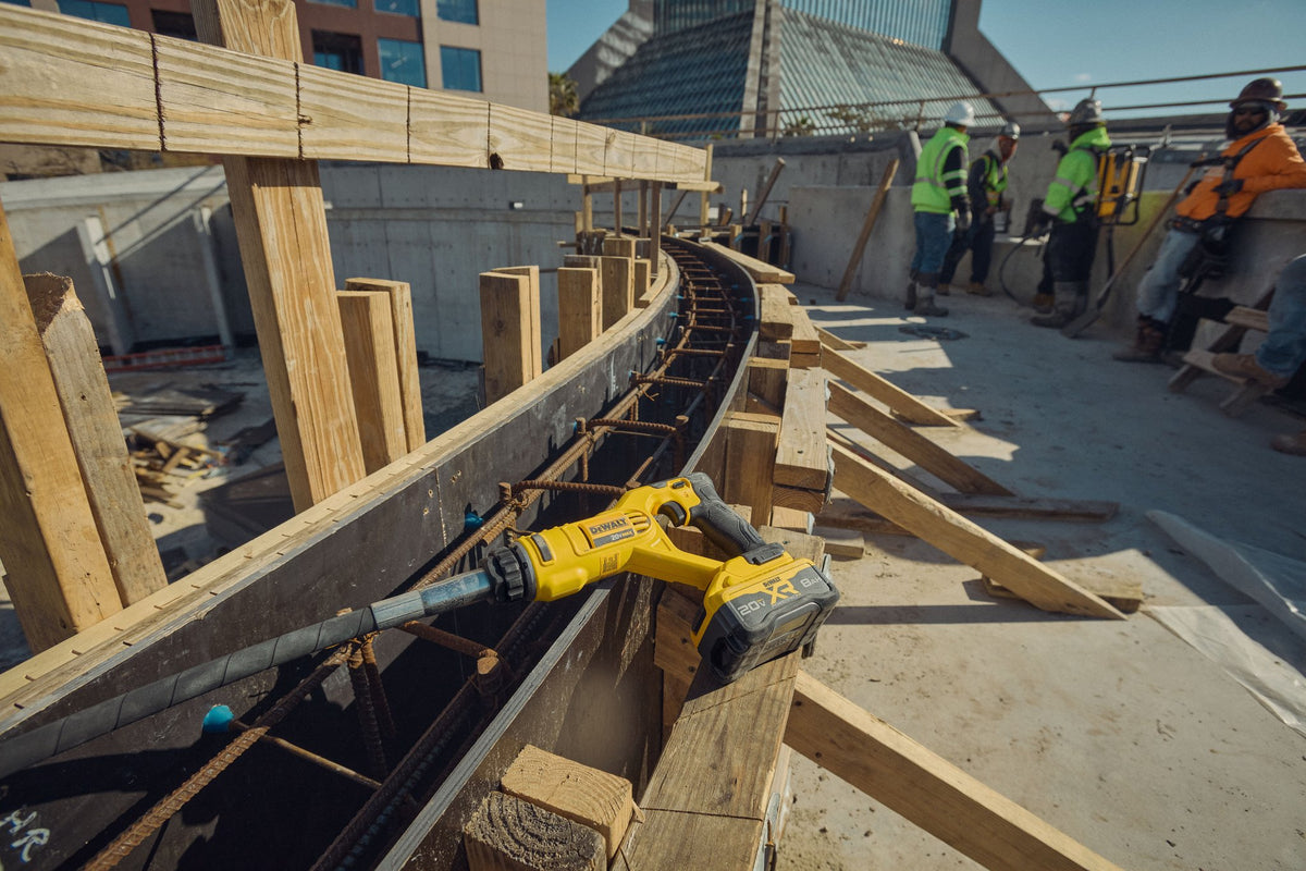 DEWALT DCE531B 20V MAX* Pencil Vibrator, Tool Only - in use