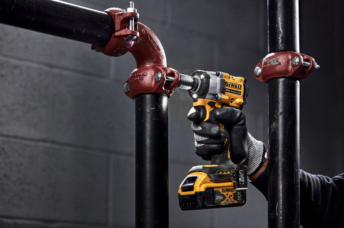 DEWALT DCF921B ATOMIC 20V MAX 1/2 in. Cordless Impact Wrench with Hog Ring Anvil (Tool Only) - in use