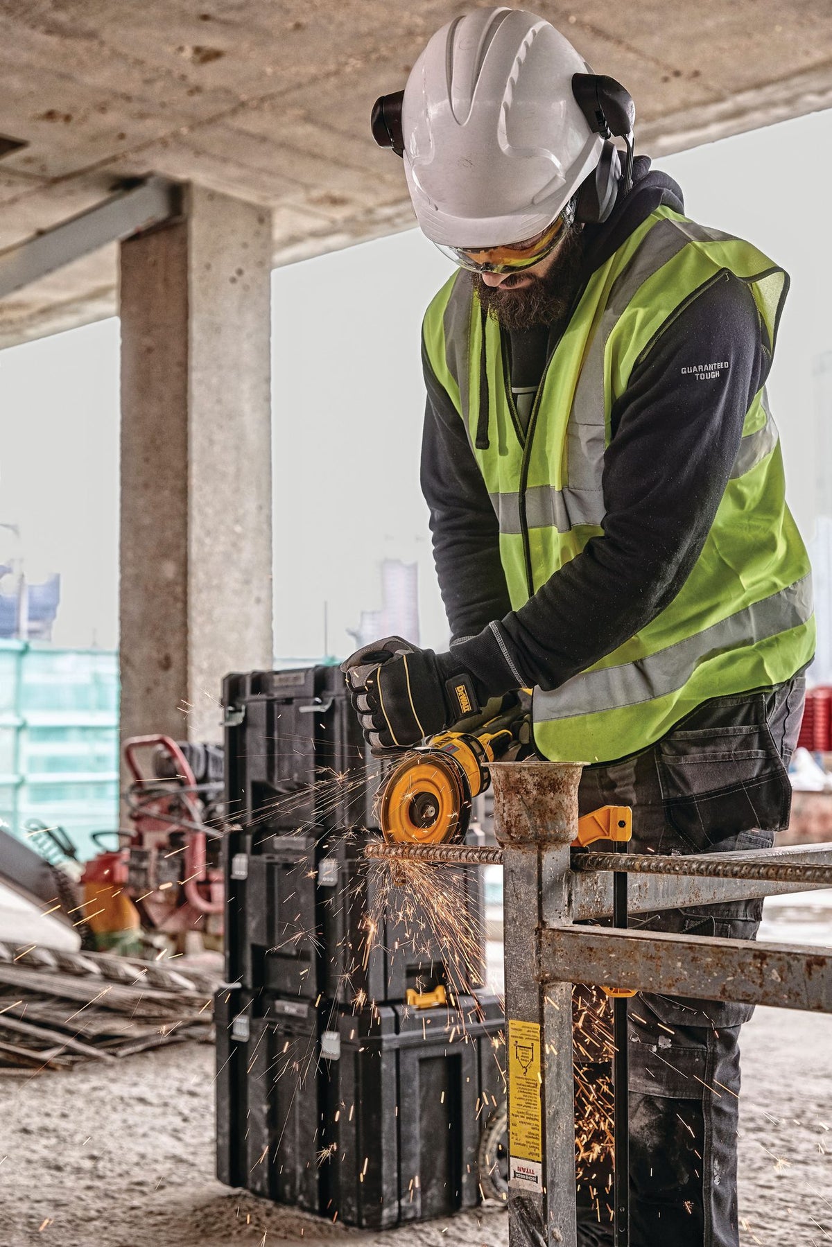 DEWALT DCG418X2 Gen 2 - 60V BRUSHLESS 4-1/2"-6" GRINDER KIT (2 - DCB609) - in use