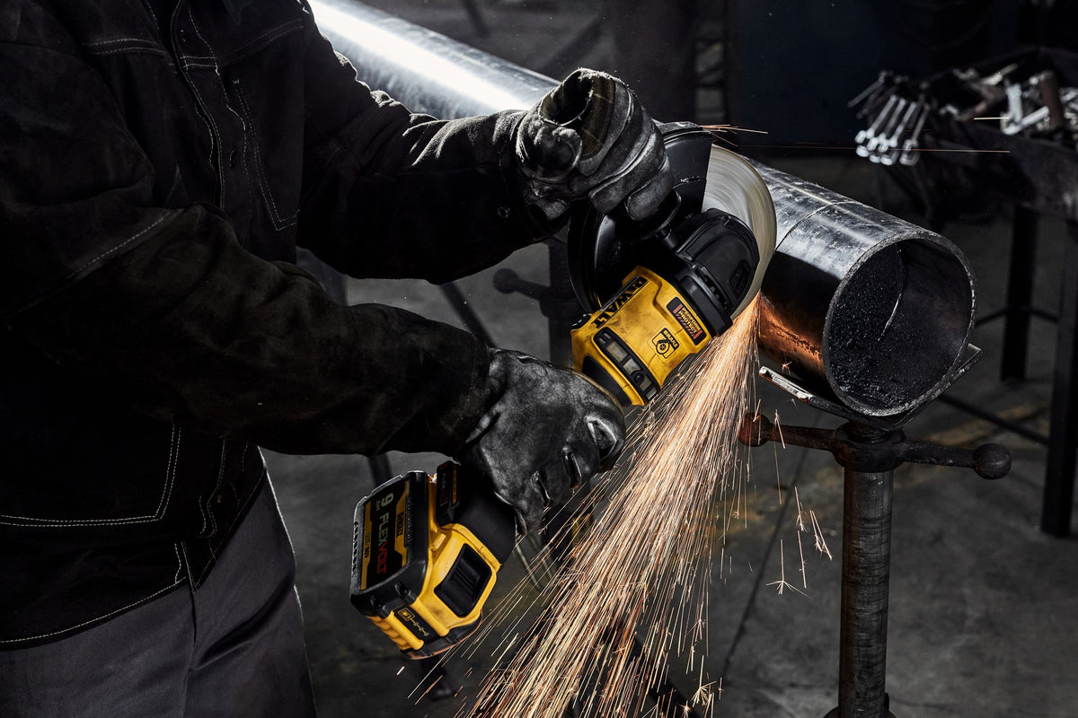 DEWALT DCG440B 60V Max 7 In. Brushless Cordless Grinder With Kickback Brake (Tool Only) - in use