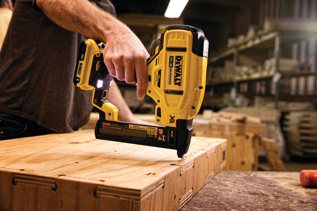 DEWALT DCN681B 20V MAX* XR® 18 GA Cordless Narrow Crown Stapler (Tool Only) - in use