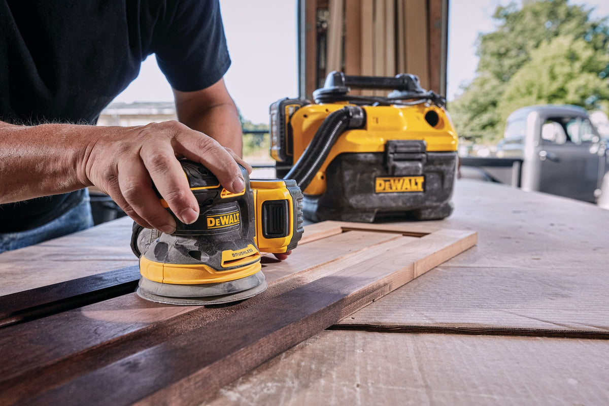 DEWALT DCW210B 20V MAX* XR 5 in Brushless Cordless Variable-Speed Random Orbital Sander (Tool Only) - in use