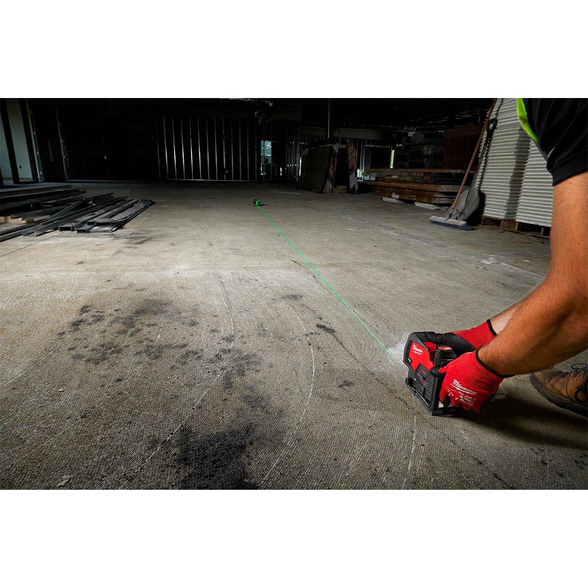 Milwaukee 3622-20 M12™ Green Cross Line & Plumb Points Laser - in use