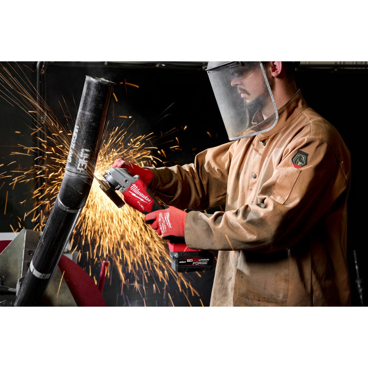 Milwaukee 3671-20 M18 FUEL™ 4-1/2"-6" Braking Grinder, Slide Switch - in use