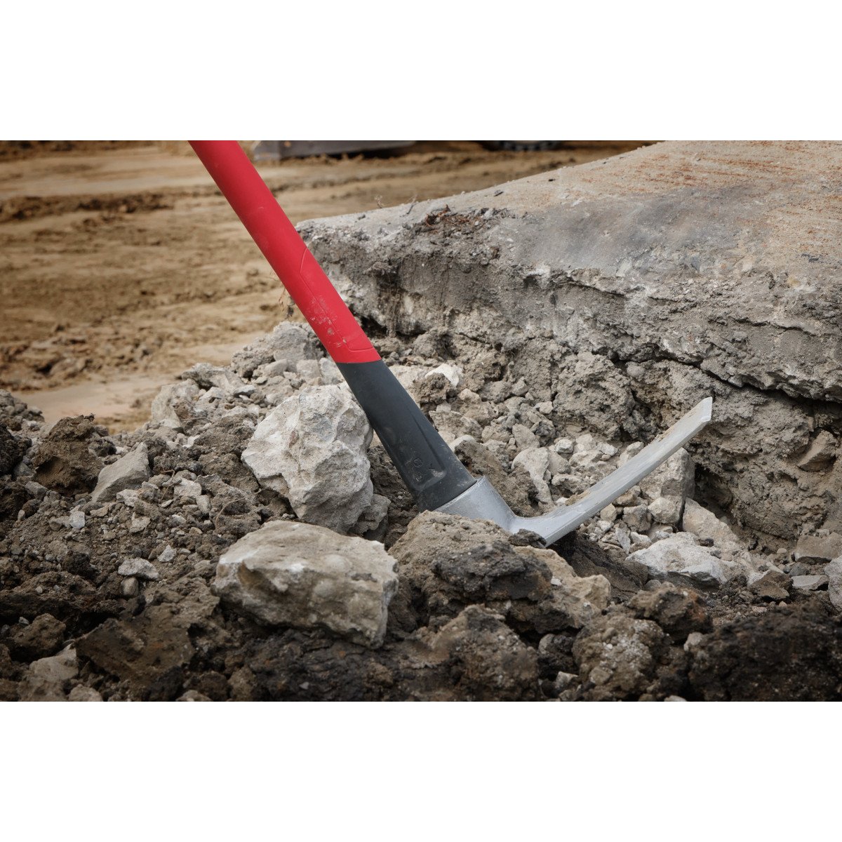 Milwaukee 48-22-9335 5lb Pick Mattock with 36-inch ShockShield Handle - in use