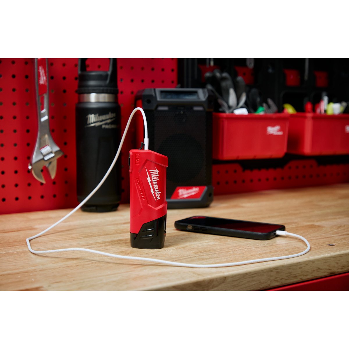 Milwaukee 48-59-1211 M12 TOP-OFF Power Supply & Charger - in use