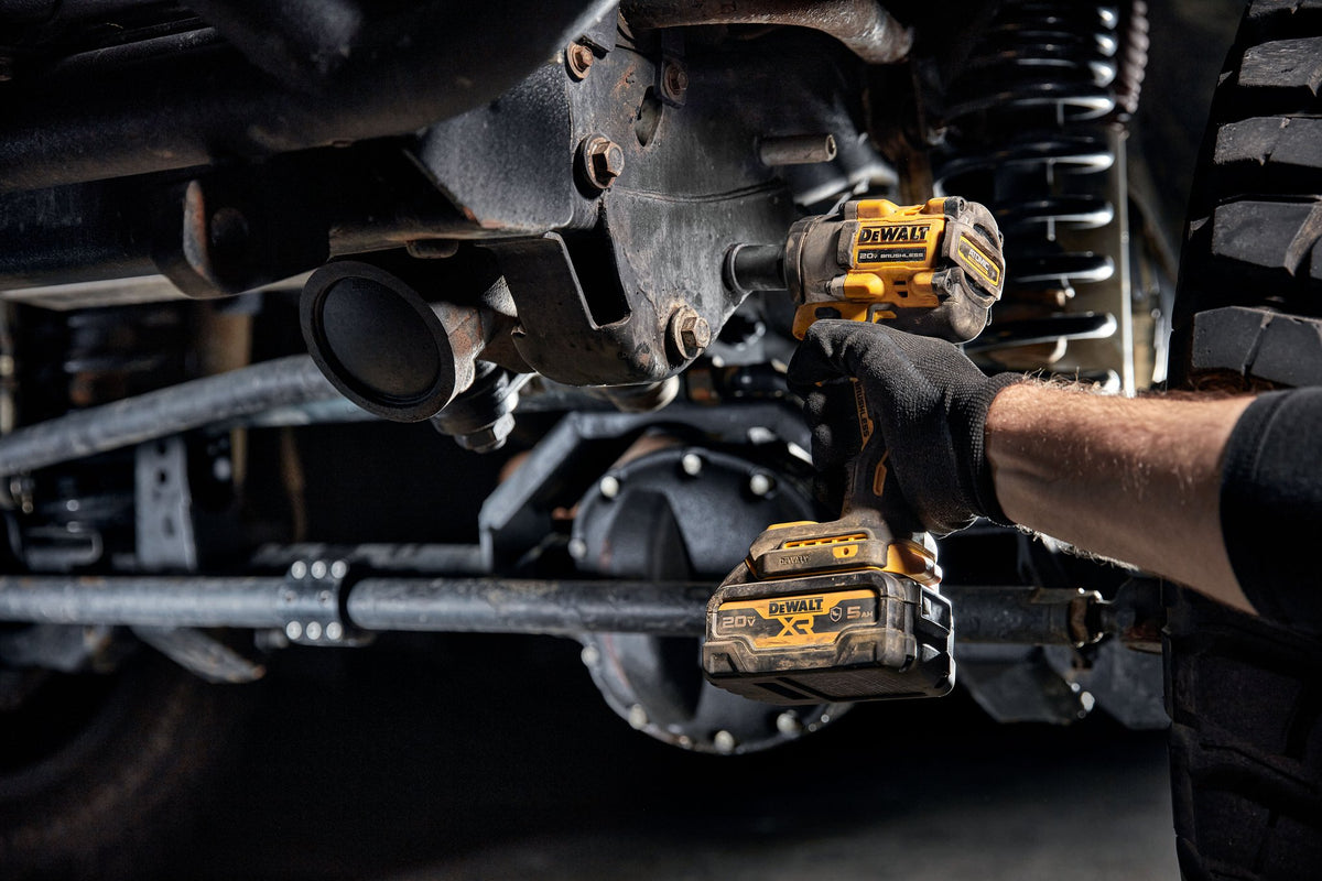 DEWALT DCF922B ATOMIC 20V MAX* 1/2 IN. CORDLESS IMPACT WRENCH WITH DETENT PIN ANVIL (TOOL ONLY) - in use