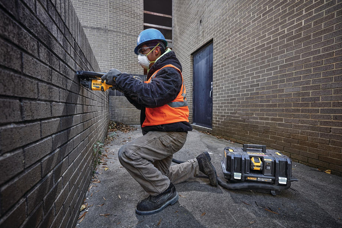 DEWALT DCG418B 60V MAX* Brushless Cordless 4-1/2 in. - 6 in. Grinder with KICKBACK BREAK (Tool Only) - in use