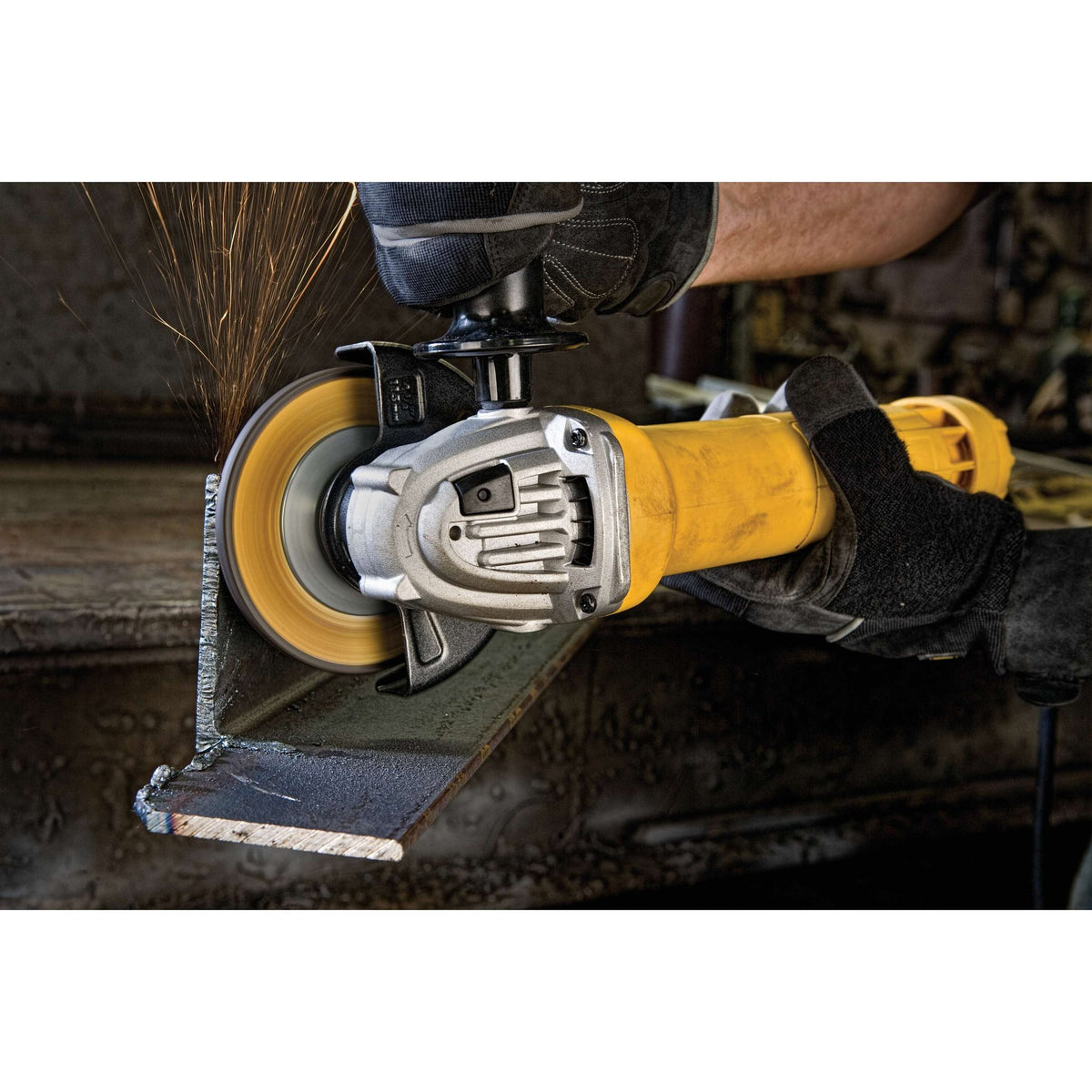 DEWALT DWE402 Angle Grinder Tool, Paddle Switch, 4-1/2-Inch, 11-Amp - in use