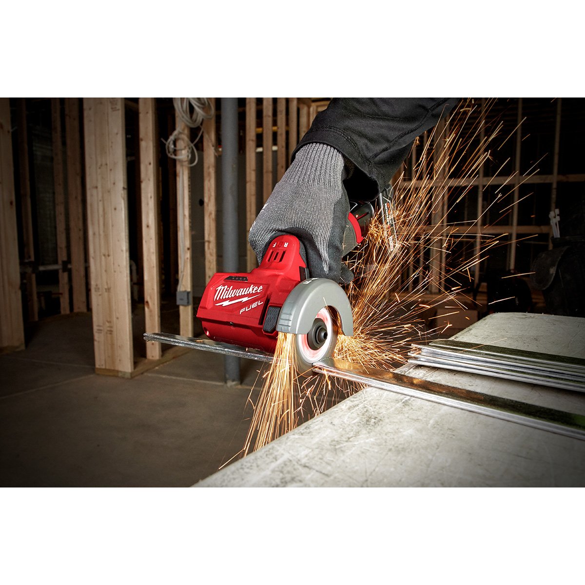 Milwaukee 2522-21XC M12 FUEL™ 3 in. Compact Cut Off Tool Kit - in use