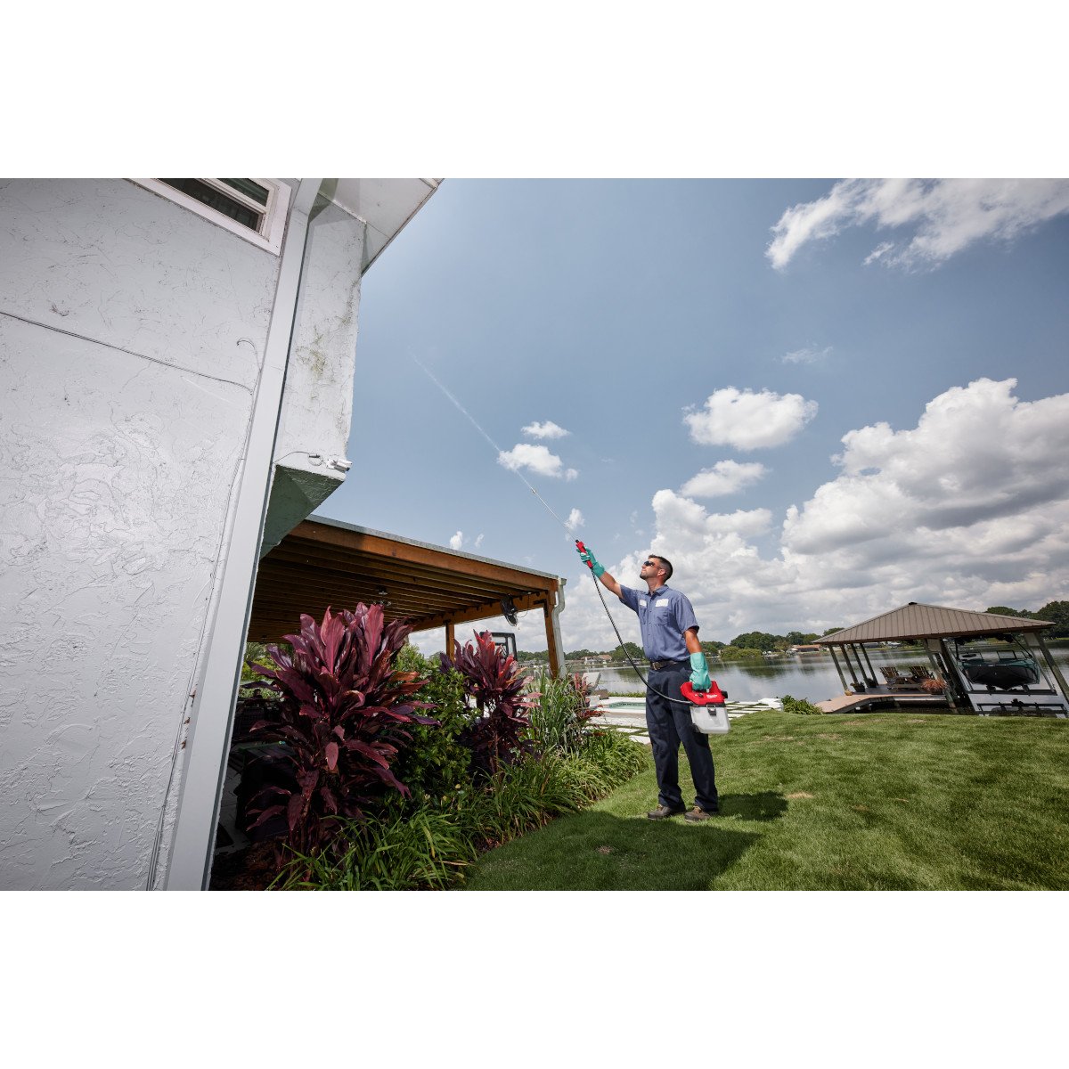 Milwaukee 2528-21G2 M12™ 2 Gallon Handheld Sprayer Kit - in use