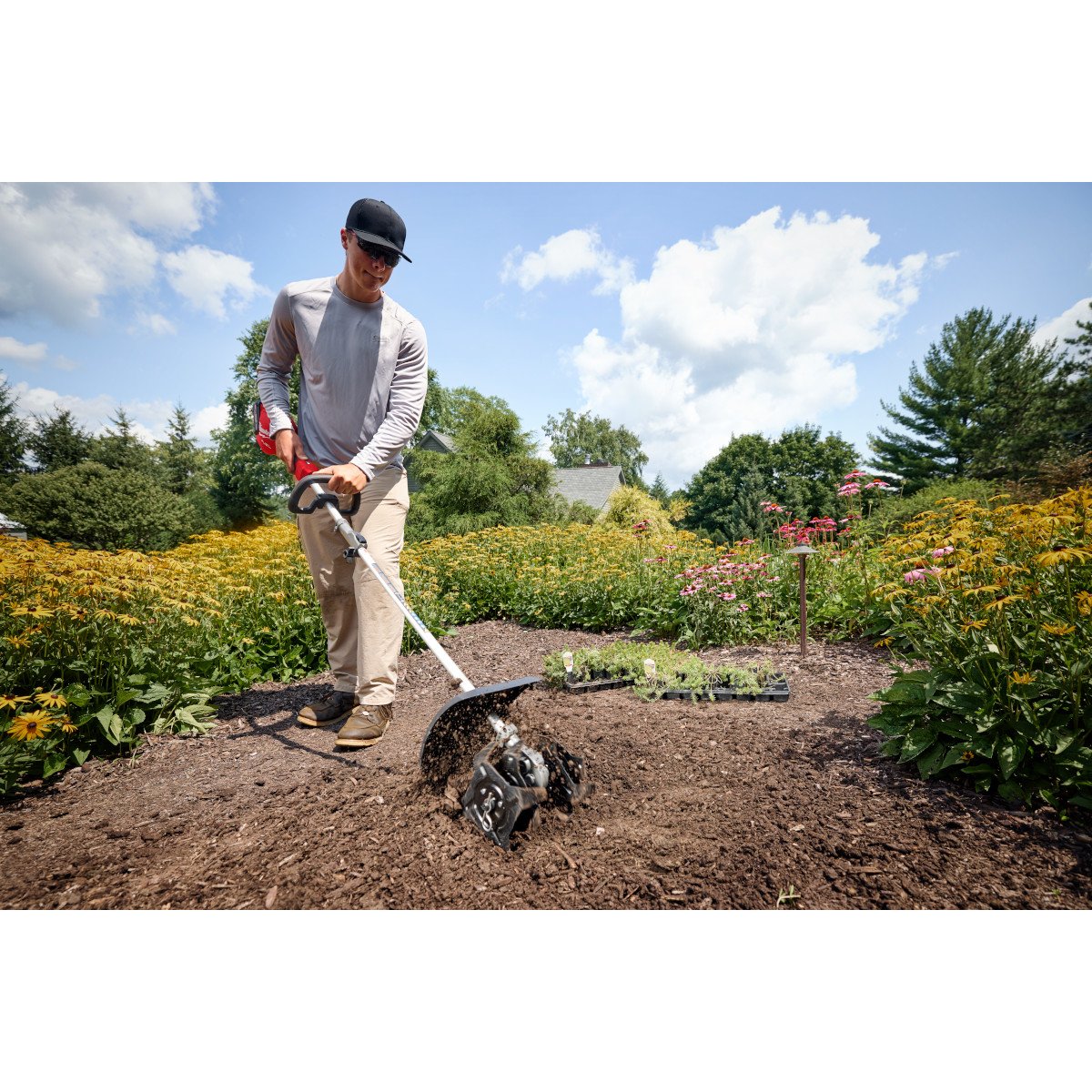 Milwaukee 3016-20ST M18 FUEL™ String Trimmer w/ QUIK-LOK™ - in use