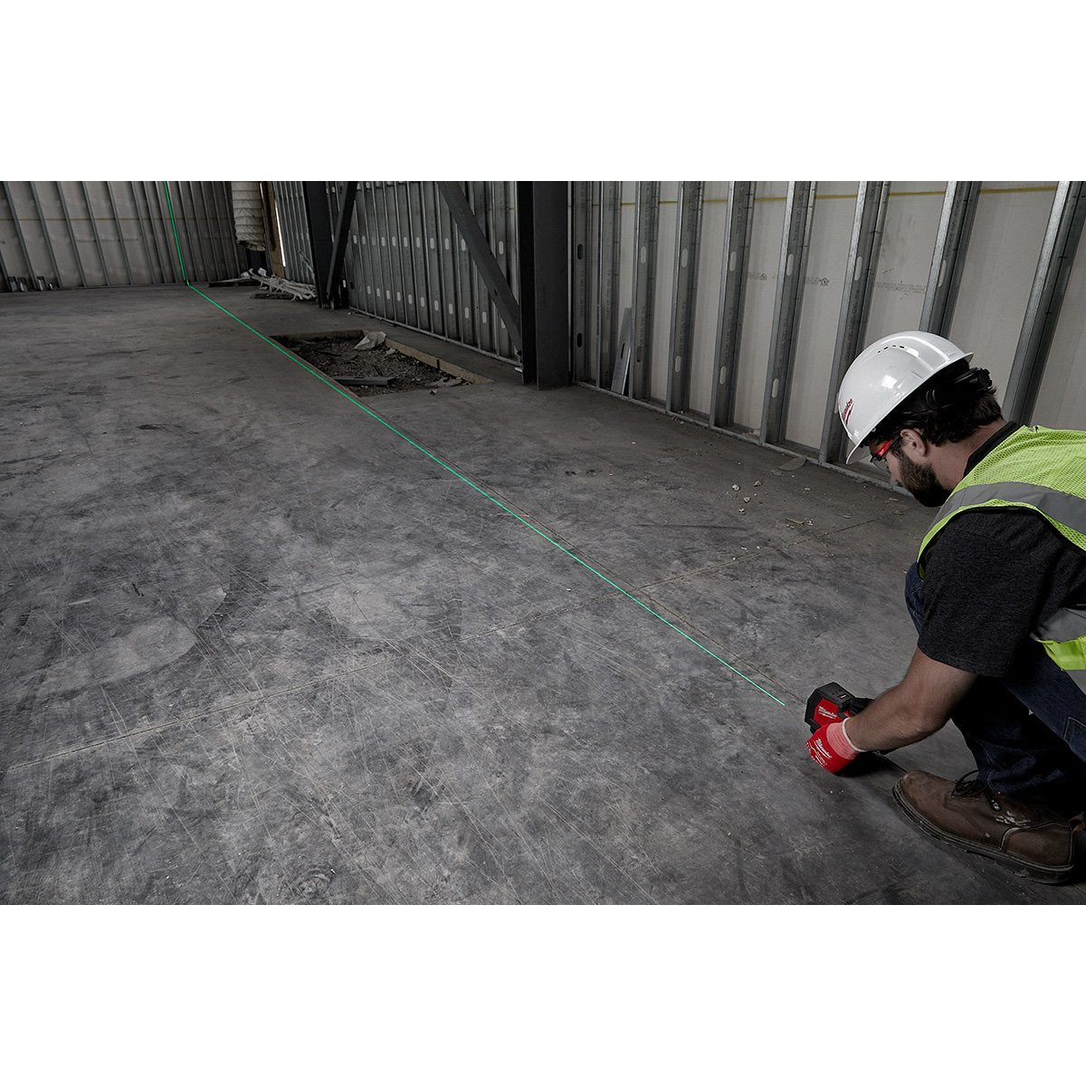 Milwaukee 3521-21 USB Rechargeable Green Cross Line Laser - in use