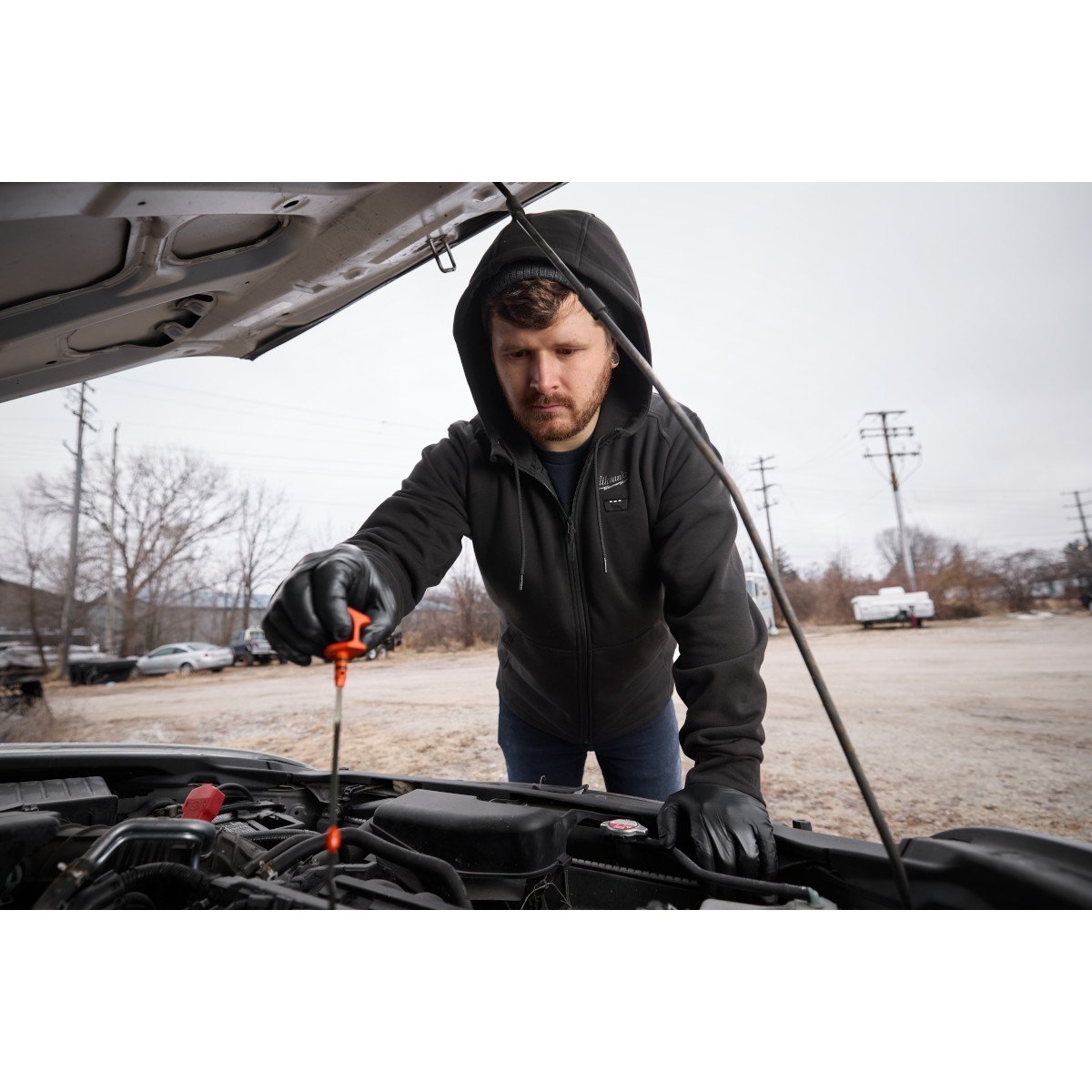 Milwaukee M200B-21S M12™ Heated Hoodie Kit - Black - S - in use