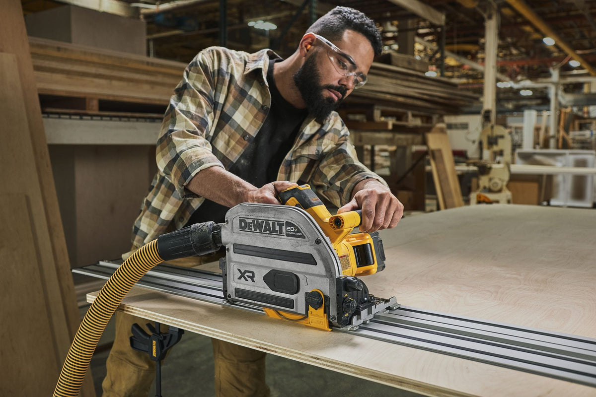 DEWALT DCS525ST in use ripping plywood on track