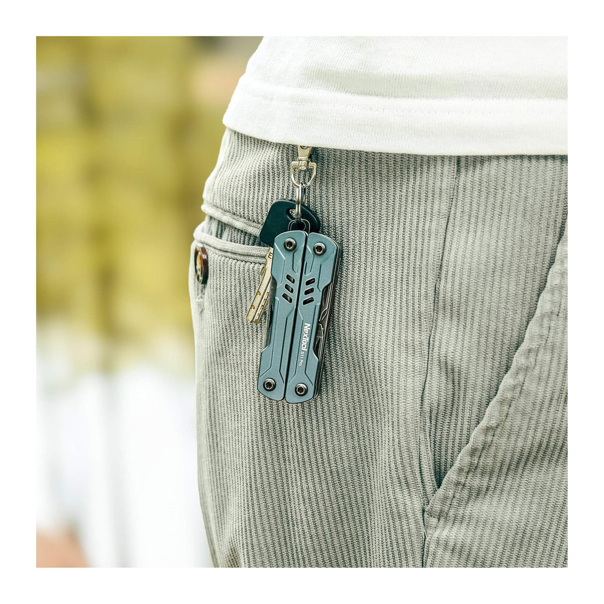 NexTool Mini Sailor S11 Pro - clipped to a pocket