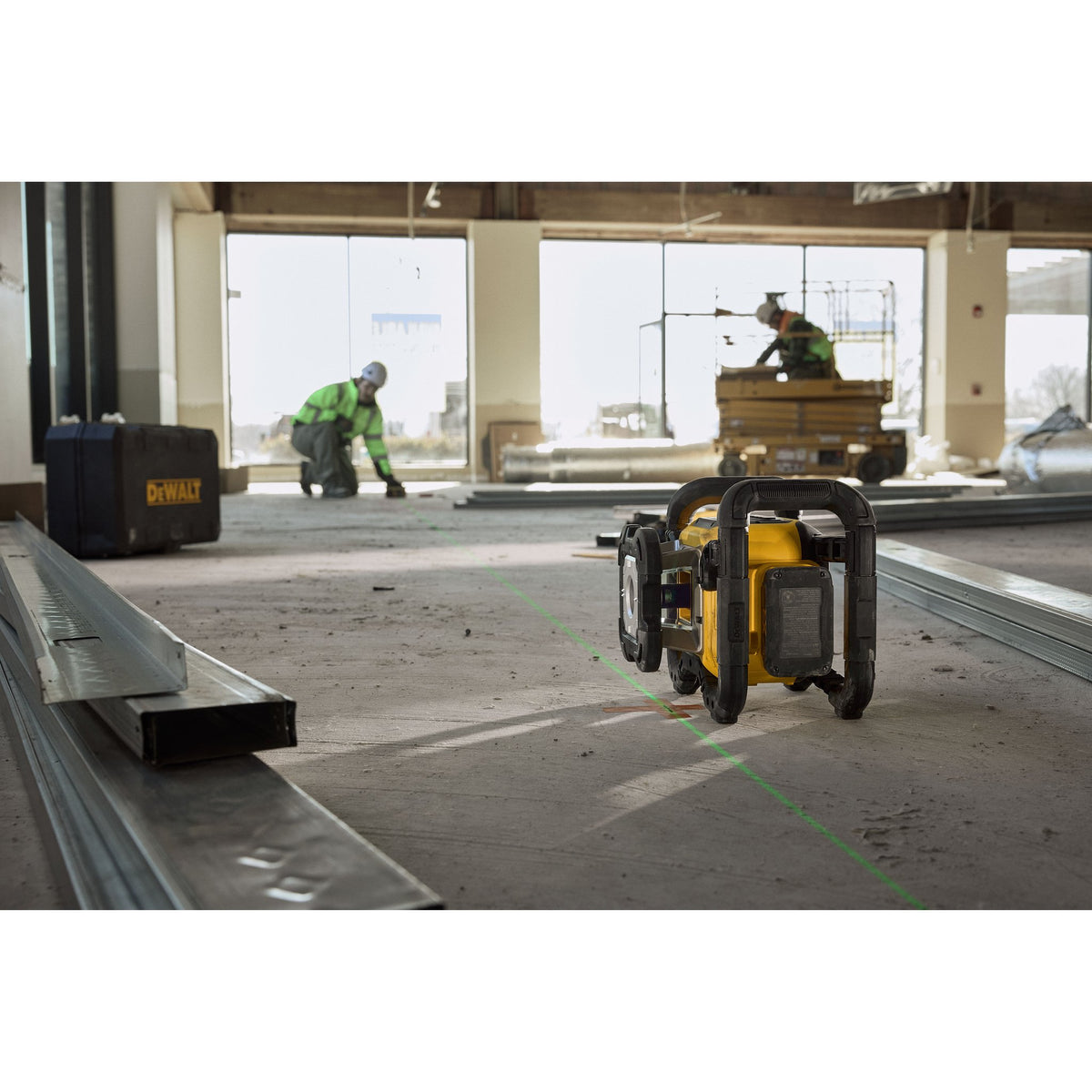 DEWALT DCLE35121GE1 20V MAX XR Green Rotary Laser Kit - in use on a commercial job site